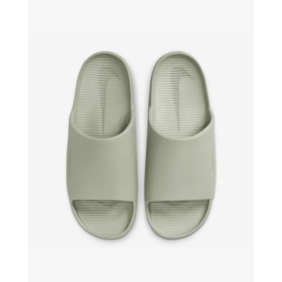 Nike Calm Slide vert- Référence FD4116-301 - Style épuré et confort au quotidien. Nike Calm Slide vert- Référence FD4116-301 - Style épuré et confort au quotidien.