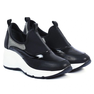 Baskets femme noires et blanches à semelle compensée – look moderne et confort supérieur – CityMode.tn