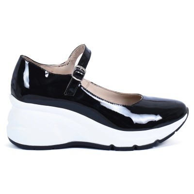 Chaussure femme en cuir verni noir avec bride et semelle compensée blanche