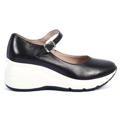 Chaussure femme en cuir noir avec bride et semelle compensée blanche