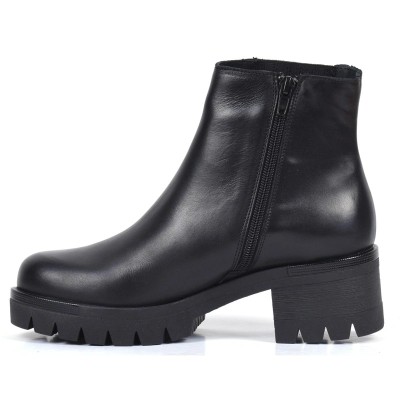 Bottine femme en cuir noir à talon épais et semelle crantée