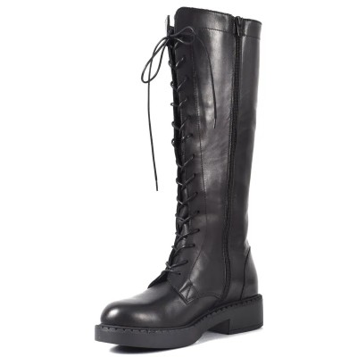 Botte femme en cuir noir avec lacets et semelle noire épaisse